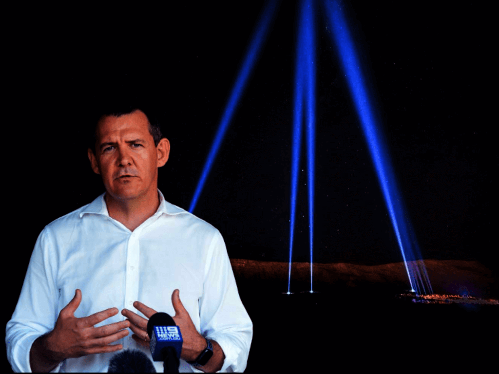 Chief Minister Michael Gunner superimposed on Parrtjima Festival lights.